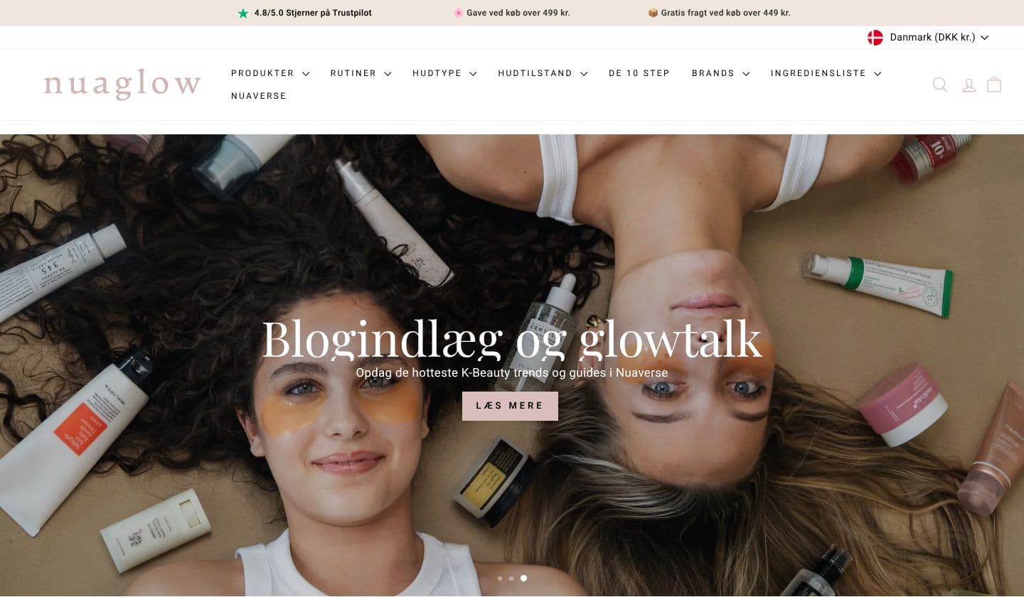 Forsiden af nuaglow.dk på en computer
